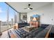 Contemporary living room with floor-to-ceiling windows providing ample natural light and stunning city views at 400 W Peachtree Nw St # 3801, Atlanta, GA 30308