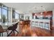 Open living space features a modern kitchen, dining area, and living room with floor to ceiling windows at 400 W Peachtree Nw St # 3801, Atlanta, GA 30308