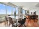 Open concept living and dining area with floor to ceiling windows with views at 400 W Peachtree Nw St # 3801, Atlanta, GA 30308