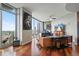 Stylish living room showcasing city views, sleek furniture, hardwood floors, and modern design elements at 400 W Peachtree Nw St # 3801, Atlanta, GA 30308