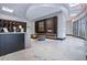 Modern lobby featuring a reception desk, seating, a fireplace, and large windows at 400 W Peachtree Nw St # 3801, Atlanta, GA 30308