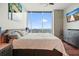 Cozy bedroom with stunning city views, featuring a plush bed, modern furnishings, and natural light at 400 W Peachtree Nw St # 3801, Atlanta, GA 30308