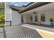 Large back deck with ceiling fan and seating area offering great outdoor space, perfect for relaxation at 110 Hawks Bnd, Canton, GA 30115