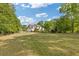 Spacious backyard with expansive grassy area, ideal for outdoor activities and recreation at 110 Hawks Bnd, Canton, GA 30115