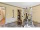 Home gym with wood trim, weight rack and closet at 110 Hawks Bnd, Canton, GA 30115