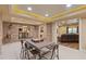 Finished basement featuring a game table and living area with plush, comfortable seating at 110 Hawks Bnd, Canton, GA 30115