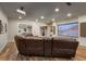 Finished basement featuring a home theater with a large screen and comfortable seating at 110 Hawks Bnd, Canton, GA 30115
