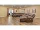 Finished basement features reclining leather couches and projector for home theater at 110 Hawks Bnd, Canton, GA 30115
