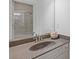 Bright bathroom vanity featuring granite countertop, brushed nickel faucet, and decorative accents at 110 Hawks Bnd, Canton, GA 30115