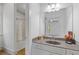 Elegant bathroom featuring a large mirror, modern sink, and glass shower at 110 Hawks Bnd, Canton, GA 30115