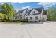 Beautiful home with a welcoming front porch and large driveway at 110 Hawks Bnd, Canton, GA 30115