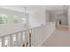 Hallway with views of the entry and staircase, offering great natural light at 110 Hawks Bnd, Canton, GA 30115