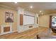 Home theater boasts wood floors and paneled walls, offering a cozy cinematic experience at 110 Hawks Bnd, Canton, GA 30115