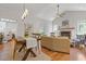 Spacious open-concept living area features vaulted ceilings and natural light at 110 Hawks Bnd, Canton, GA 30115