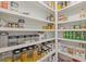 Well-organized pantry with ample shelving and clear storage containers at 110 Hawks Bnd, Canton, GA 30115