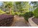 Backyard water feature with stone pathway and lush landscaping at 110 Hawks Bnd, Canton, GA 30115