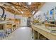 Functional workshop with exposed ceiling, workbenches and organized tool storage at 110 Hawks Bnd, Canton, GA 30115