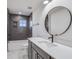 Contemporary bathroom features a dark framed mirror and subway tiled shower at 180 Paislee Park (Lot #9 Paislee Park) Dr, Fayetteville, GA 30215