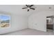 Bright bedroom features a window with backyard view and ensuite bathroom at 180 Paislee Park (Lot #9 Paislee Park) Dr, Fayetteville, GA 30215