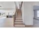 Home Foyer with a view of the kitchen and staircase at 180 Paislee Park (Lot #9 Paislee Park) Dr, Fayetteville, GA 30215