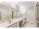 Spacious bathroom featuring double sinks, lots of counter space, and natural light at 15104 Harvest Ridge Ln, Alpharetta, GA 30022