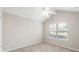 Neutral bedroom with ceiling fan and natural light at 15104 Harvest Ridge Ln, Alpharetta, GA 30022