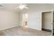 Cozy bedroom features plush carpet and neutral paint at 15104 Harvest Ridge Ln, Alpharetta, GA 30022
