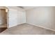 Bedroom with plush carpet, neutral paint, and closet at 15104 Harvest Ridge Ln, Alpharetta, GA 30022