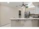 Kitchen with granite countertops, stainless steel appliances, and breakfast bar at 15104 Harvest Ridge Ln, Alpharetta, GA 30022