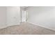 Comfortable bedroom features neutral carpet, white walls, a window and a closet at 1924 Browns Mill Se Rd, Atlanta, GA 30315