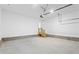 Spacious garage with concrete floors and stairway access to the home at 1924 Browns Mill Se Rd, Atlanta, GA 30315