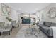 Bright open-concept living room and kitchen featuring modern decor and stainless appliances at 1924 Browns Mill Se Rd, Atlanta, GA 30315