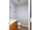 Neutral half bath with a traditional sink, toilet and cabinet at 4230 Waldrop Hills Ter, Decatur, GA 30034