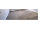 This bedroom showcases neutral walls and plush carpeting at 4230 Waldrop Hills Ter, Decatur, GA 30034