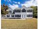 Charming two-story home with classic black shutters and a well-manicured lawn at 4230 Waldrop Hills Ter, Decatur, GA 30034