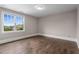 Bedroom with natural light and hardwood floors at 4900 Kentwood Dr, Marietta, GA 30068