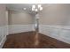 Formal dining room with chair rail molding and hardwood floors for an elegant touch at 4900 Kentwood Dr, Marietta, GA 30068