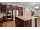 Beautiful kitchen with granite countertops, stainless steel appliances, and ample storage space at 4900 Kentwood Dr, Marietta, GA 30068