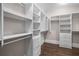 The walk-in closet features multiple storage solutions: shelves, drawers and hanging rods at 4900 Kentwood Dr, Marietta, GA 30068