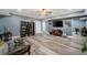 Finished basement showcasing wood floors, neutral walls, and a media area perfect for entertaining at 7505 Antique Barn Ave, Cumming, GA 30041