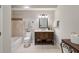 This bathroom features a decorative-tile surround in the shower/tub, and an attractive vanity at 7505 Antique Barn Ave, Cumming, GA 30041