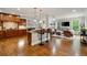 Open-concept living space featuring a modern kitchen and a cozy living area at 7505 Antique Barn Ave, Cumming, GA 30041