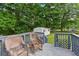 Relax on this back deck with nice backyard views; shed and gazebo in yard at 8136 Connally Dr, Douglasville, GA 30134