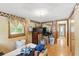 Cozy bedroom with hardwood floors and bright window, ready for personalized touches and ample storage at 8136 Connally Dr, Douglasville, GA 30134