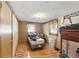 Bedroom with hardwood floors, a closet, single bed and window at 8136 Connally Dr, Douglasville, GA 30134