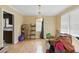 Spacious dining room with hardwood floors, chandelier and natural light at 8136 Connally Dr, Douglasville, GA 30134