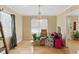 Bright dining room with hardwood floors and chandelier at 8136 Connally Dr, Douglasville, GA 30134