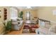 Bright living room with hardwood floors, ceiling fan and comfortable seating at 8136 Connally Dr, Douglasville, GA 30134
