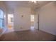 Spacious bedroom featuring wall to wall carpet, neutral walls and two entries to other spaces at 319 Barbados Ln, Suwanee, GA 30024