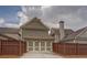 Spacious two-car garage in an upscale community behind a privacy fence at 319 Barbados Ln, Suwanee, GA 30024
